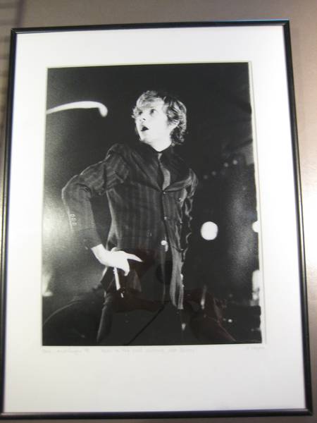 someone selling a framed photo of beck from this show